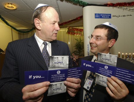 Blue lines: Metropolitan Police Commissioner Sir John Stevens, with PC Danny Phillips